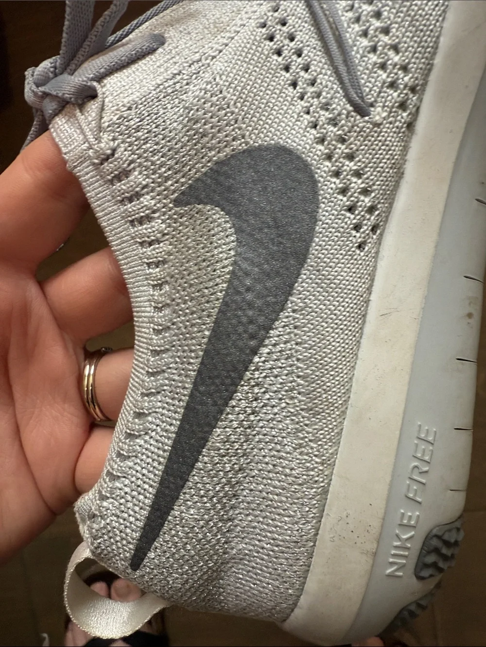 Nike Women's Light Gray Flyknit Training Sneakers